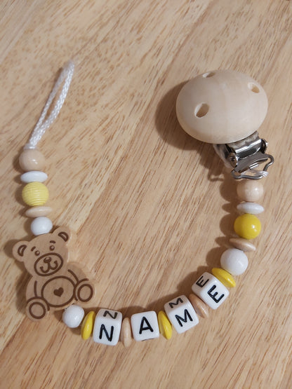 Handgemachte Schnullerkette Bär (Rosa, Blau, Natur/Gelb)