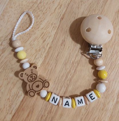 Handgemachte Schnullerkette Bär (Rosa, Blau, Natur/Gelb)