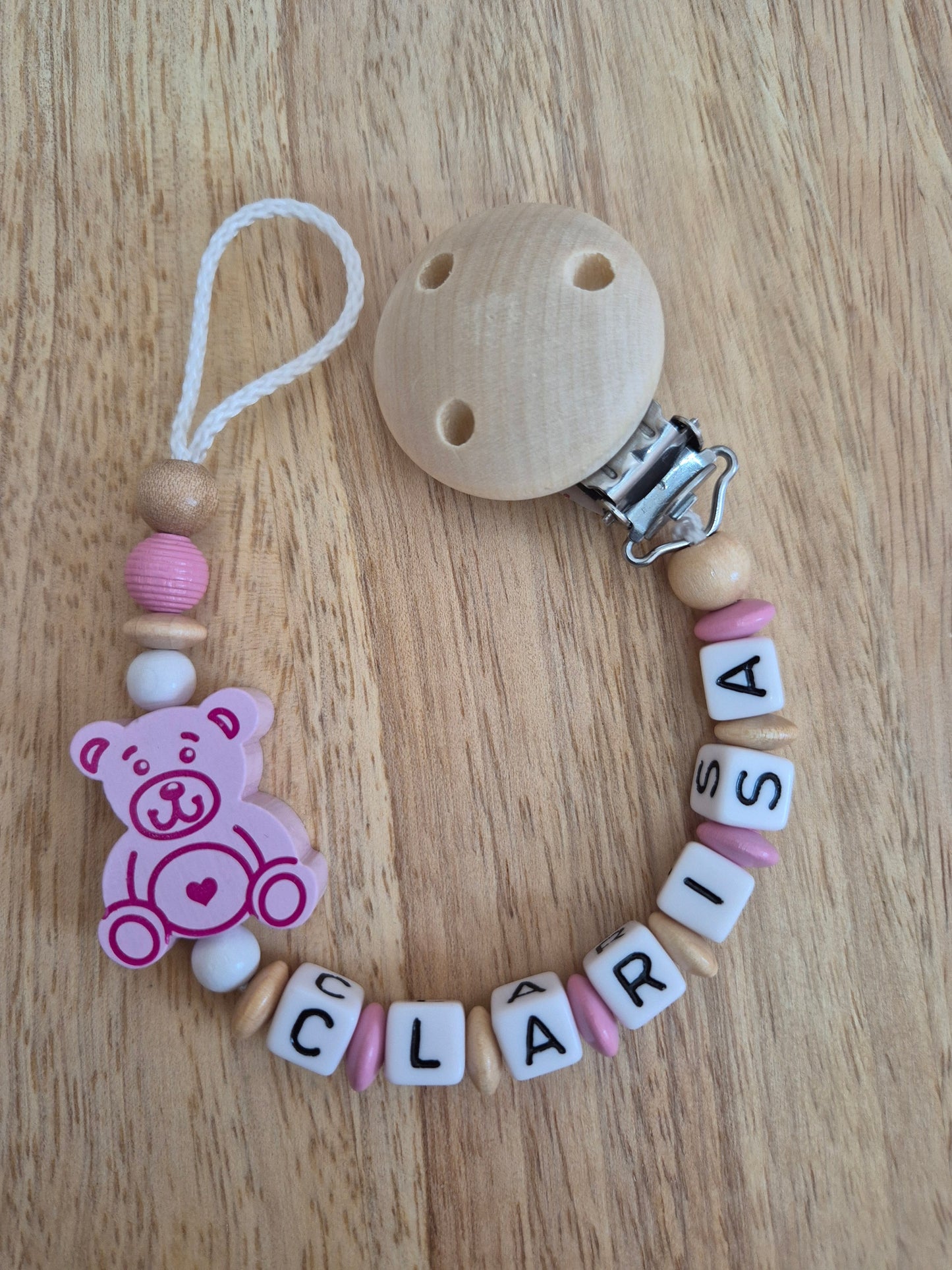 Handgemachte Schnullerkette Bär (Rosa, Blau, Natur/Gelb)