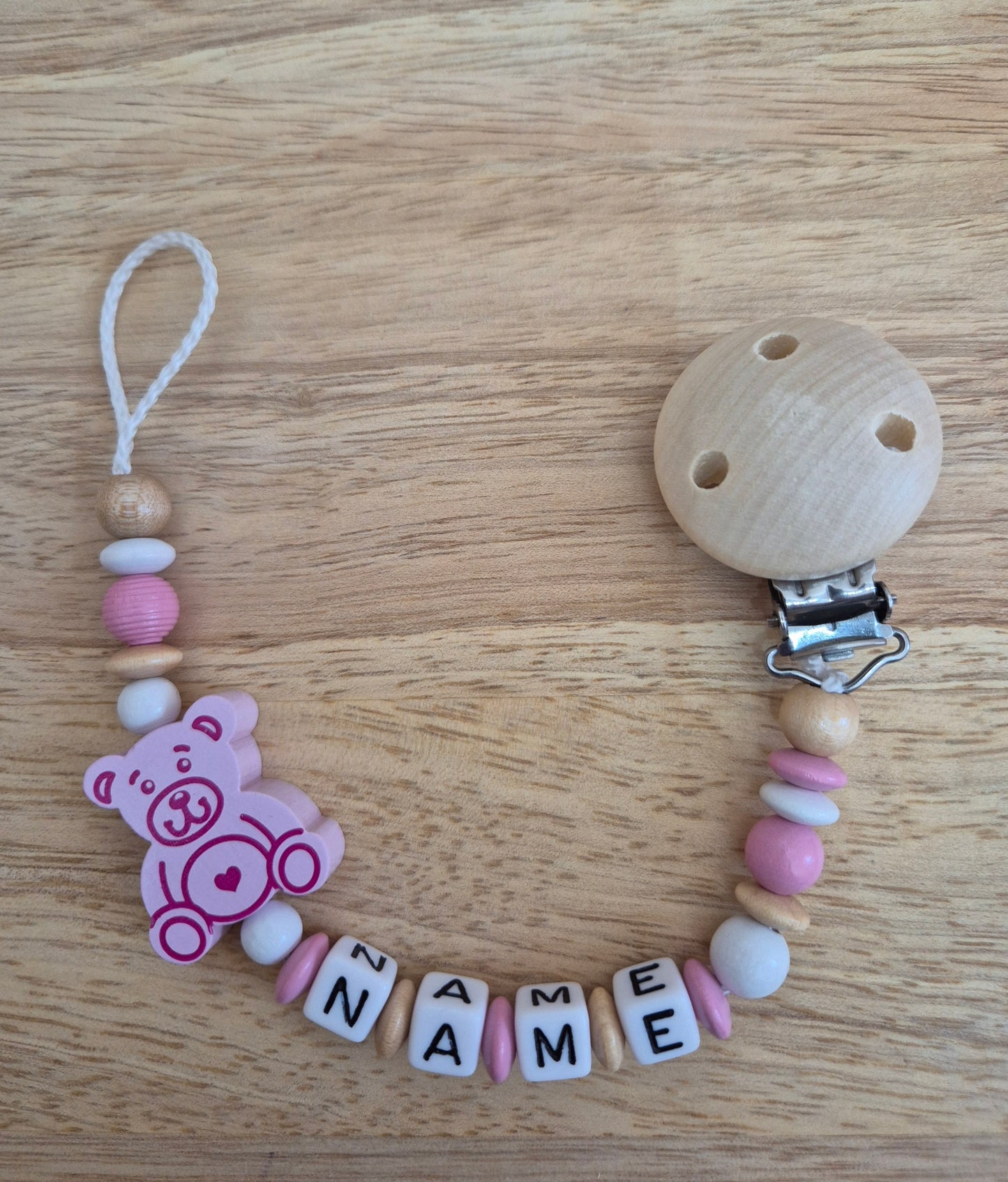 Handgemachte Schnullerkette Bär (Rosa, Blau, Natur/Gelb)