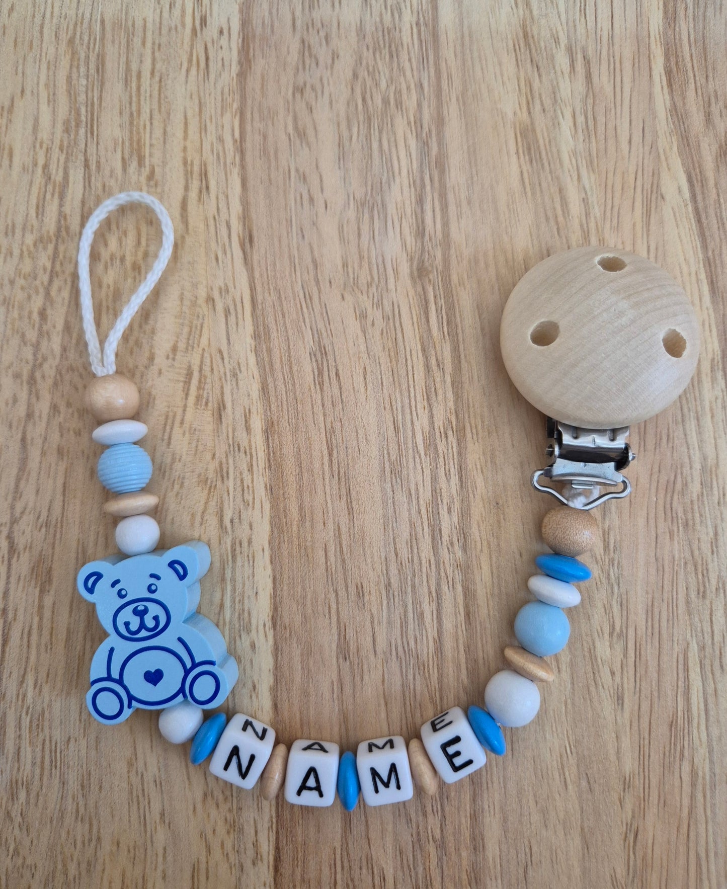 Handgemachte Schnullerkette Bär (Rosa, Blau, Natur/Gelb)