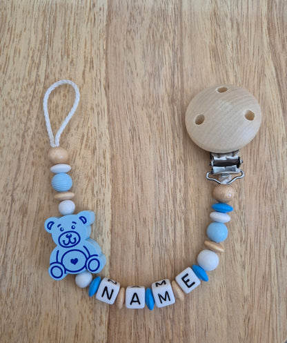 Handgemachte Schnullerkette Bär (Rosa, Blau, Natur/Gelb)